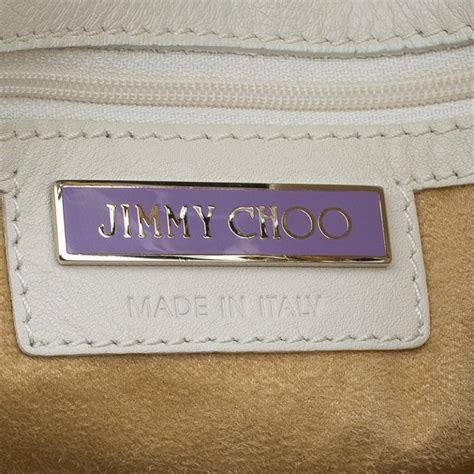 how to tell real versus fake jimmy choo bag|jimmy choo logo.